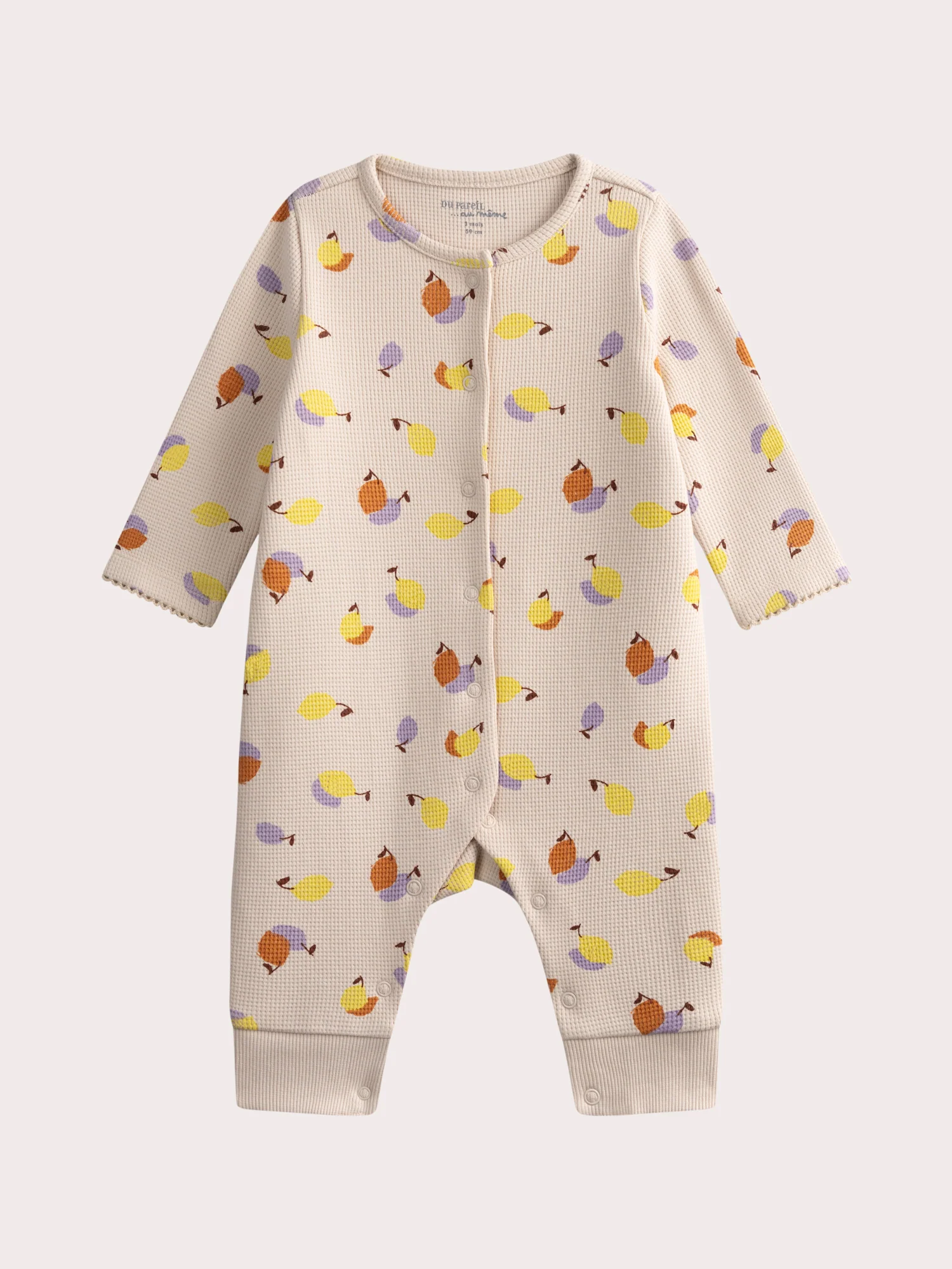 Grenouillere beige imprimée pour bébé fille