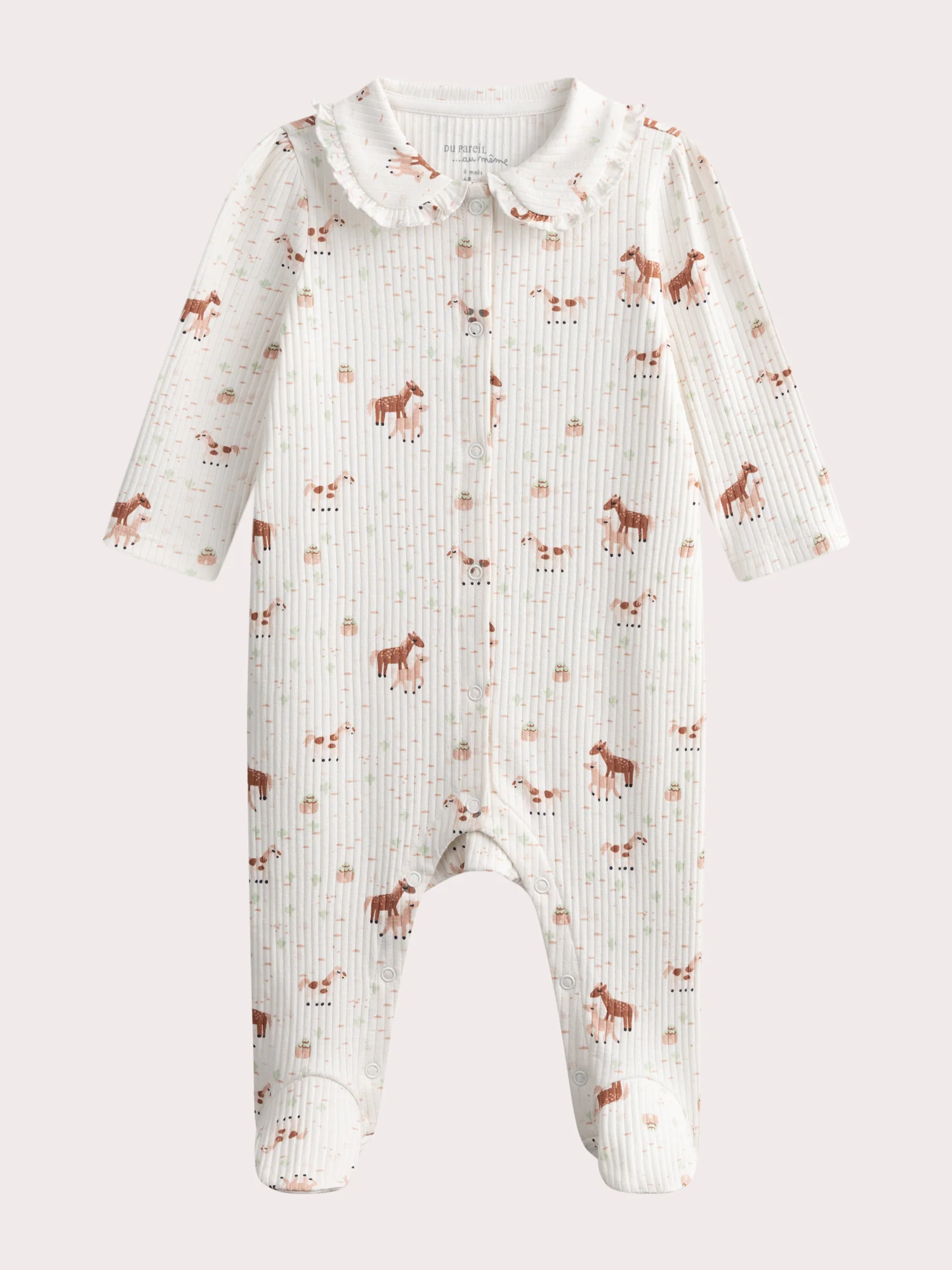 Grenouillere écru à motifs pour bébé fille