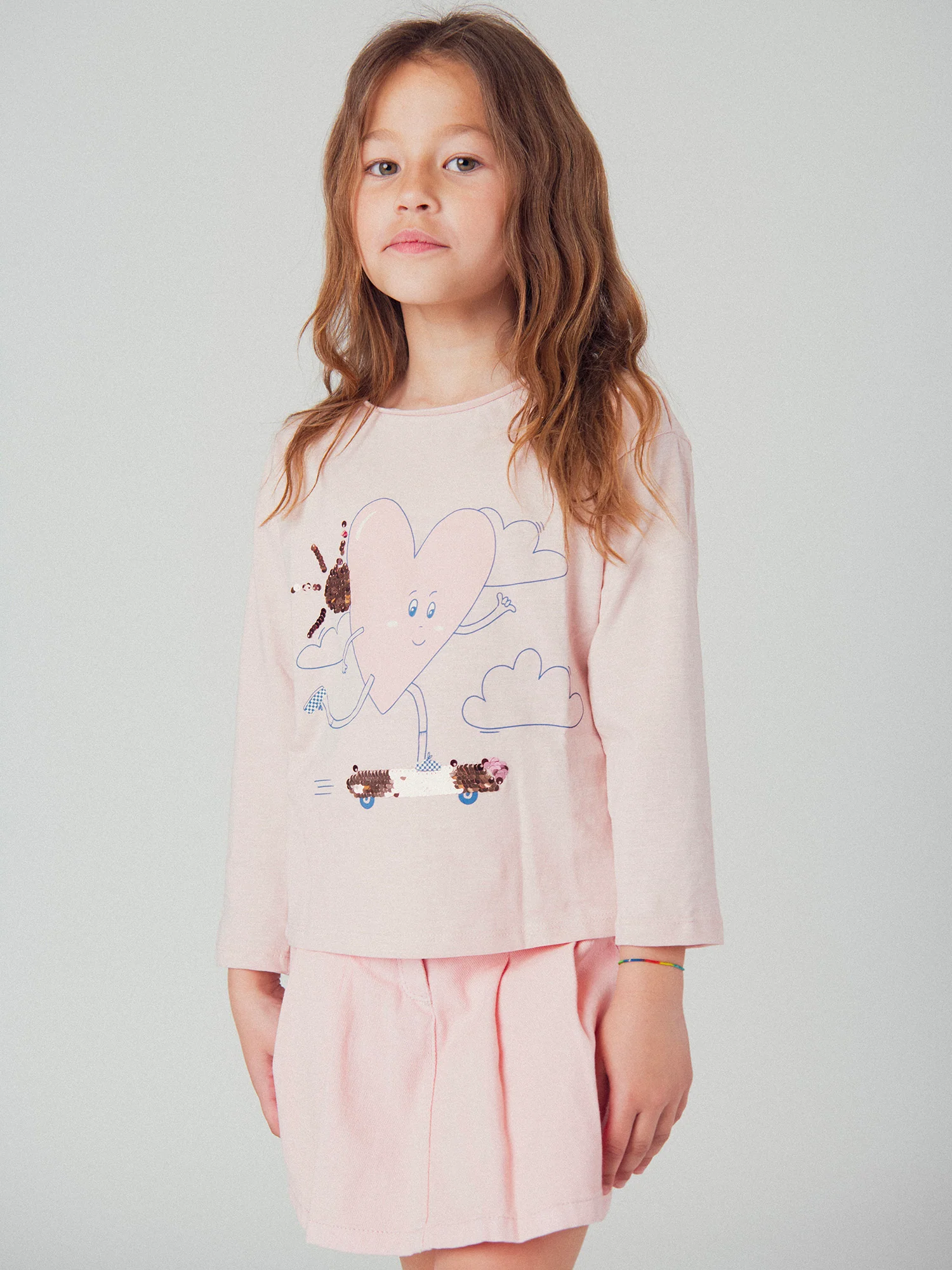 Jupe short rose à poches pour fille - Image 2