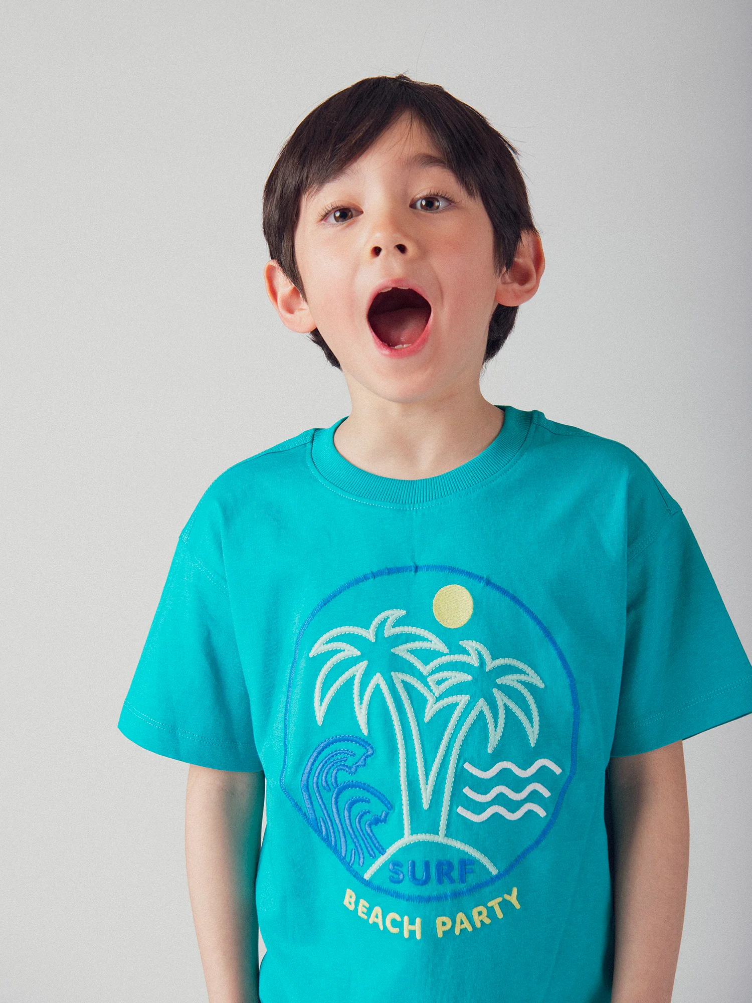 T-shirt bleu turquoise animation plage pour garçon - Image 3