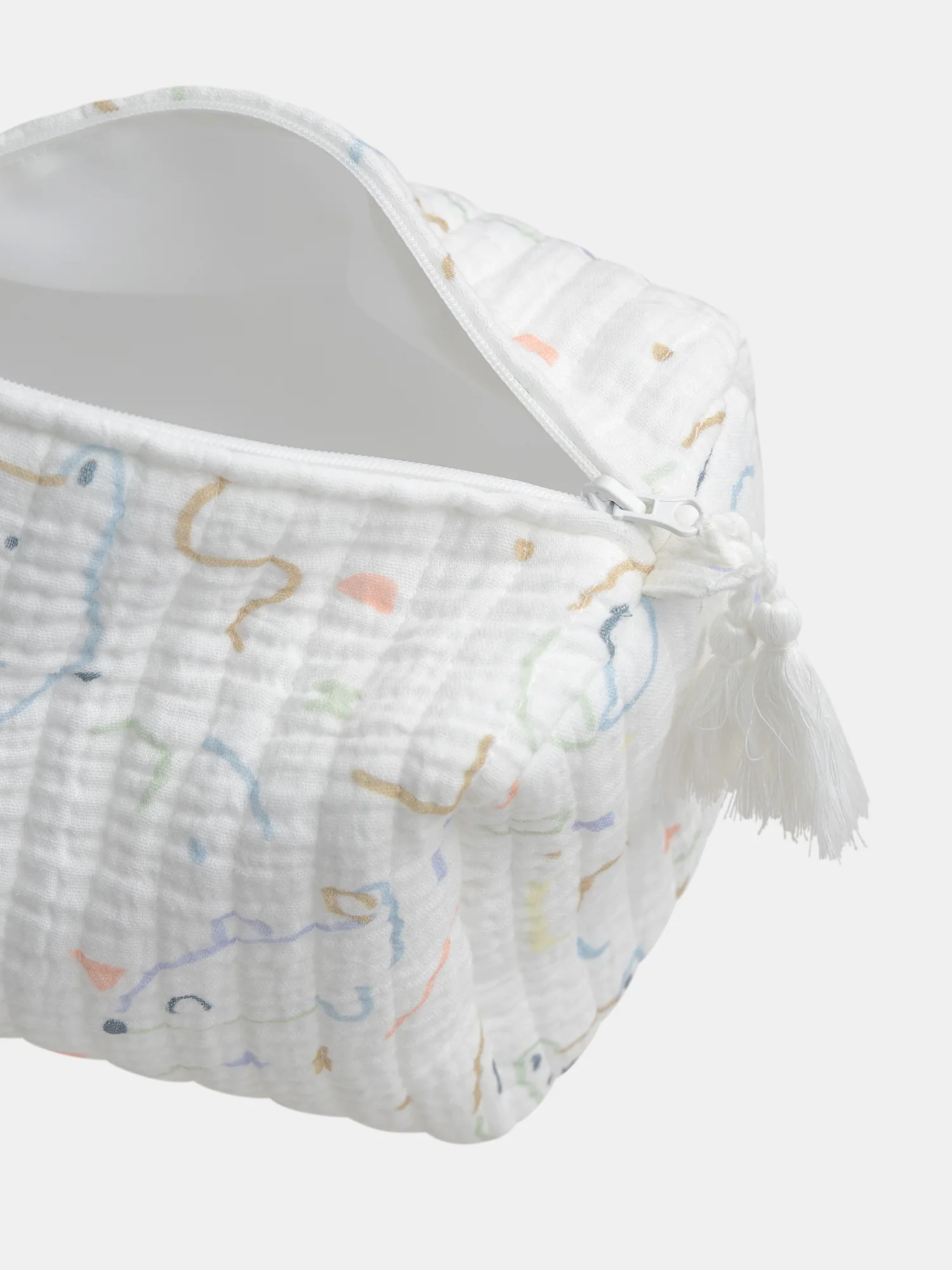 Trousse à imprimé fantaisie et pompon - Image 4