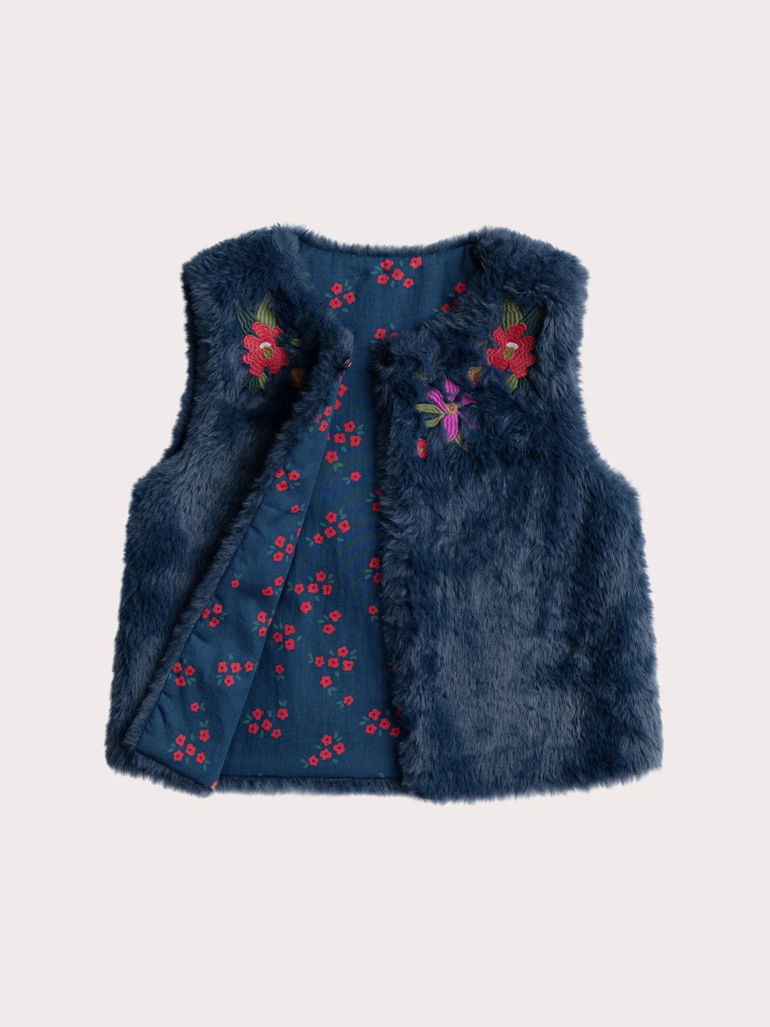 Veste sans manches brodée en fourrure synthétique